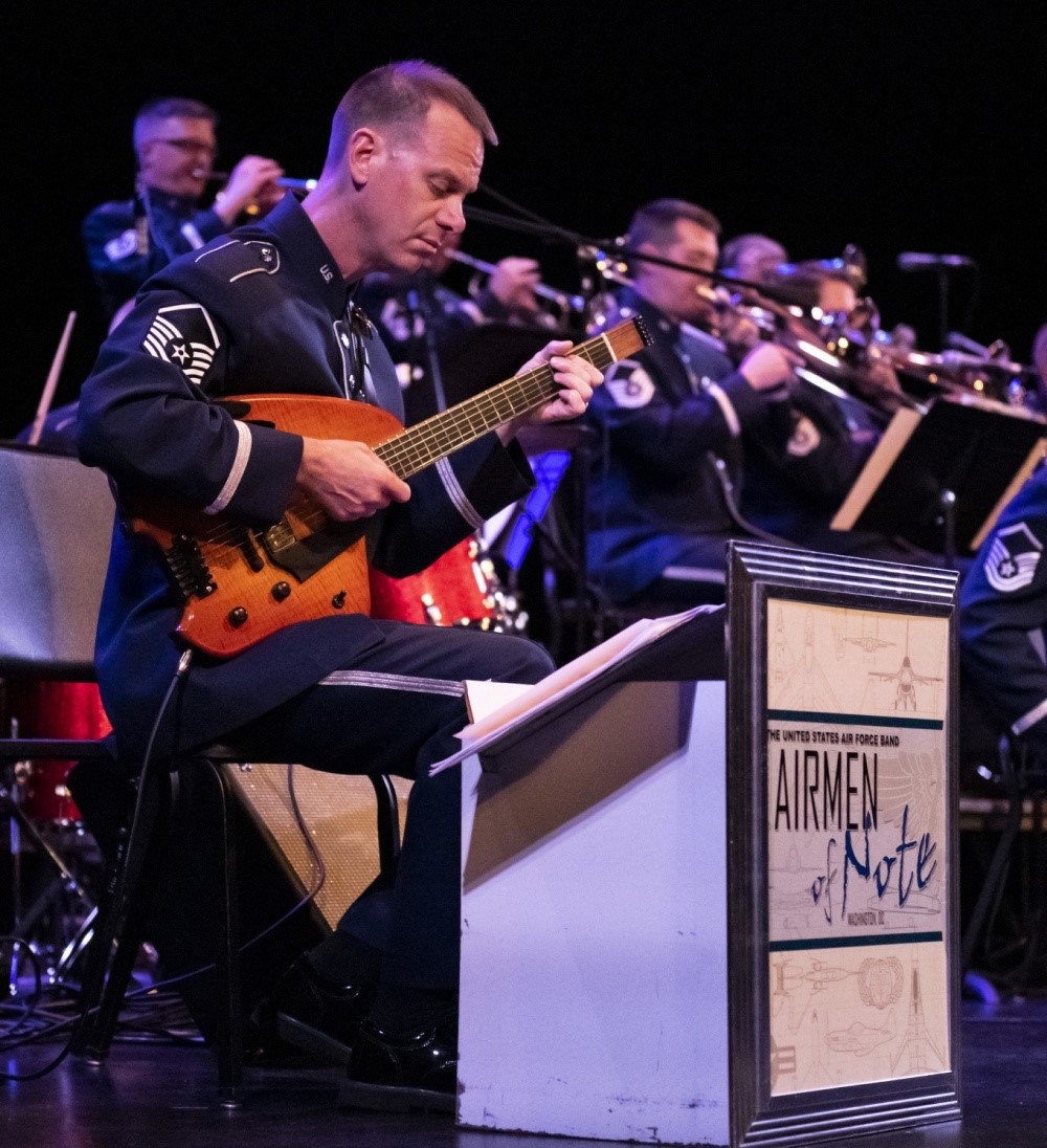 An Air Force band member performs.