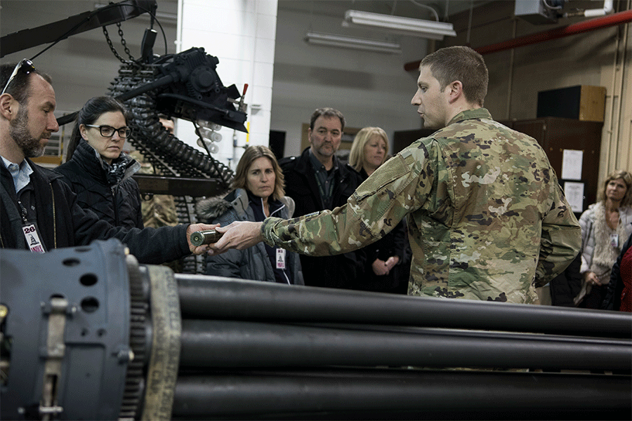 An Airman gives a tour at the 122nd Fighter Wing.