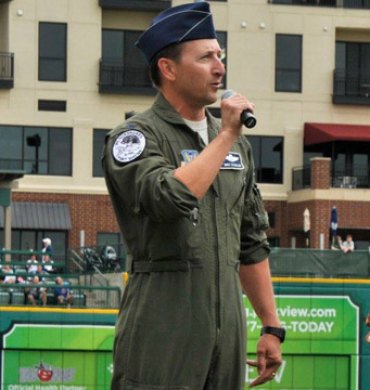 An officer speaks at a public event.